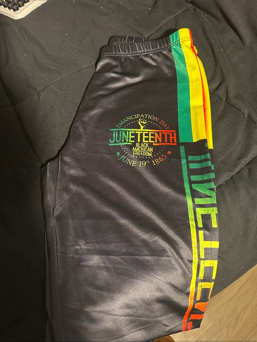 Juneteenth Graphic Track Pants in Black with Red, Yellow & Green Accents